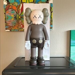 Gray and White KAWS Art Toy Figure